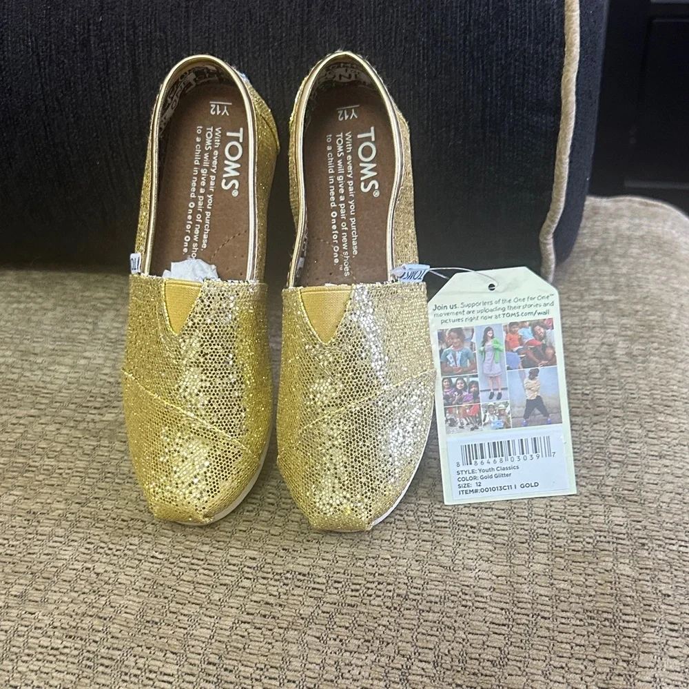 TOMS Kids Glitter Slip-On Shoes in Gold size Y12